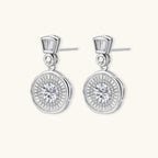 Art Deco-inspired sterling silver drop earrings with tiered moissanite stones in geometric sunburst design