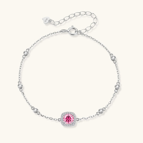 Elegant sterling silver chain bracelet featuring pink moissanite center stone in cushion halo setting with adjustable clasp