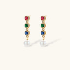 Gold-plated jewelry set with red, green, and blue cubic zirconia stones including necklace, bracelet, and drop earrings.